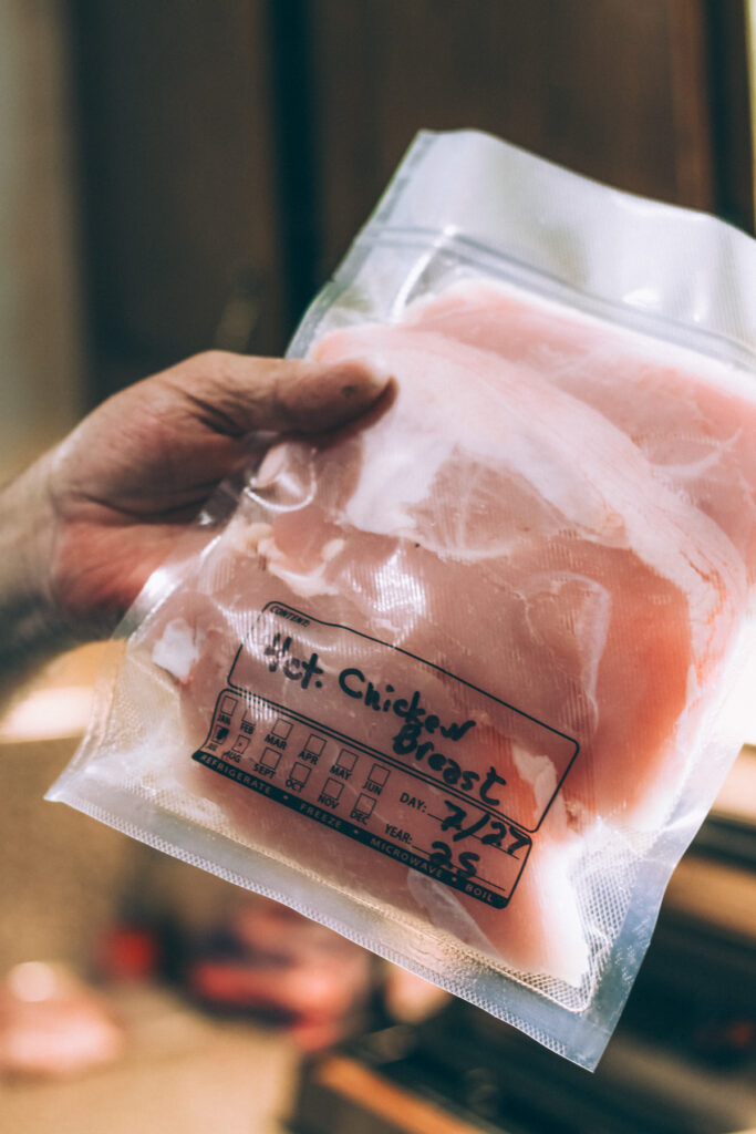One vacuum-sealed bag of chicken ready for freezer storage.